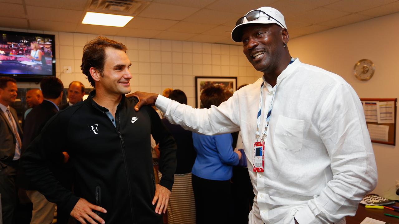 Roger Federer eventually managed to meet his idol Michael Jordan following a match on Day Two of the 2014 US Open at the USTA Billie Jean King National Tennis Center on August 26, 2014. (Photo by Chris Trotman/Getty Images for USTA)