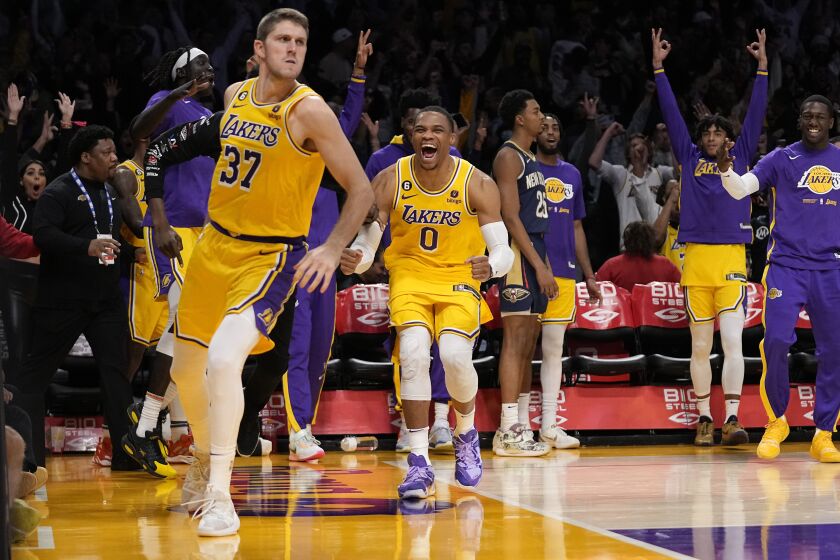 Matt Ryan celebrates with Russell Westbrook after hitting a shot to tie the game