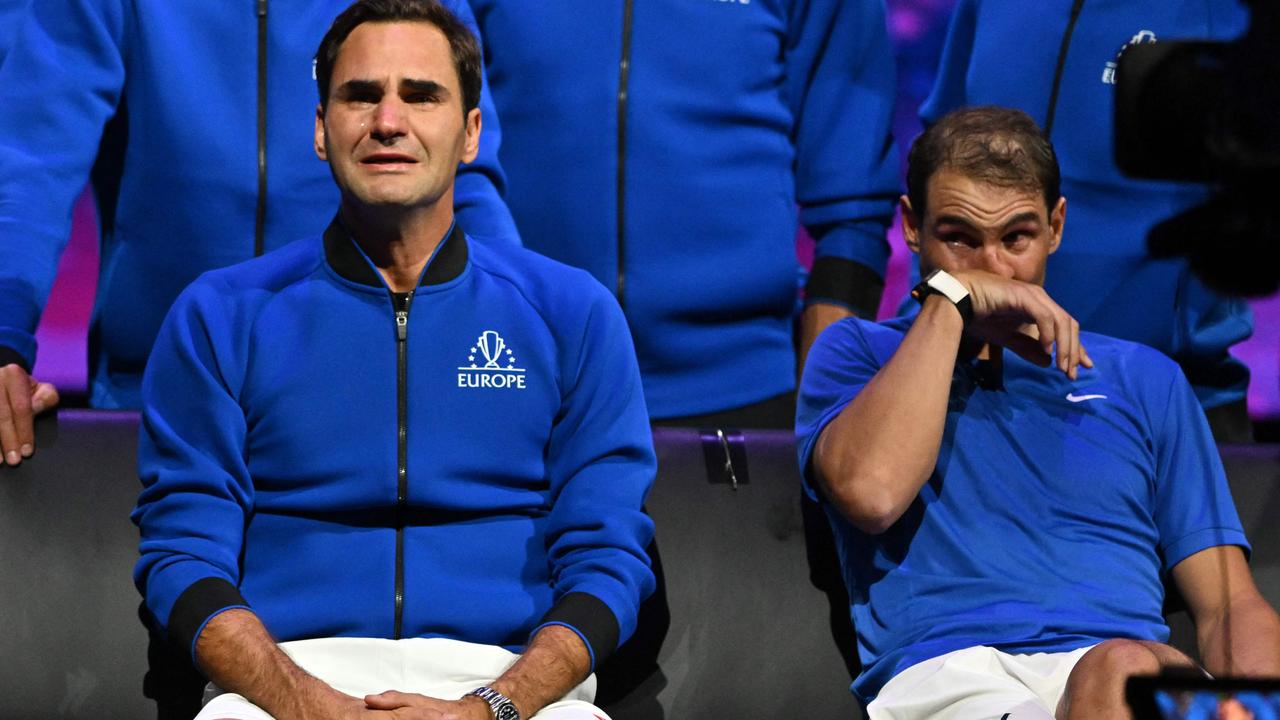 Roger and Rafa were in tears. (Photo by Glyn KIRK / AFP)