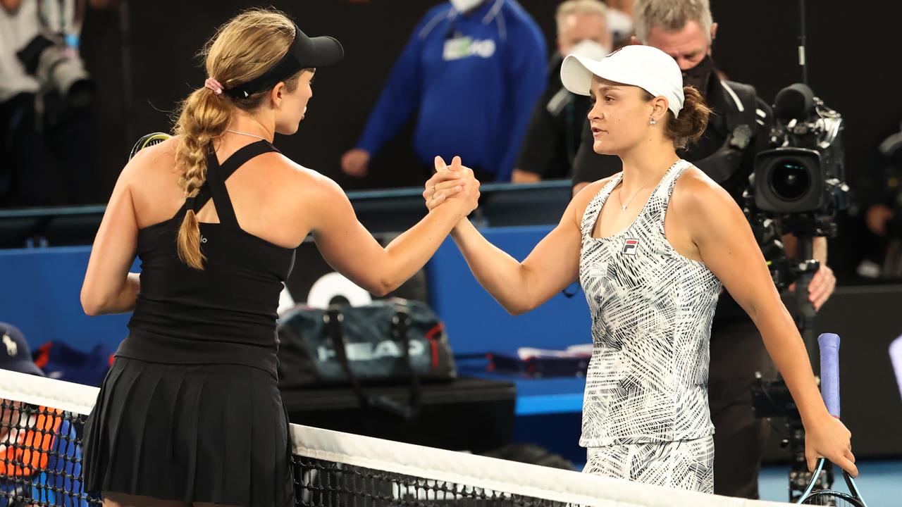 Ash Barty and Danielle Collins meet at the net on Rod Laver Arena. Picture: David Caird.