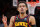 ATLANTA, GEORGIA - DECEMBER 21: Trae Young #11 of the Atlanta Hawks reacts after shooting a three-point basket against the Chicago Bulls during the second quarter at State Farm Arena on December 21, 2022 in Atlanta, Georgia. NOTE TO USER: User expressly acknowledges and agrees that, by downloading and or using this photograph, User is consenting to the terms and conditions of the Getty Images License Agreement. (Photo by Kevin C. Cox/Getty Images)
